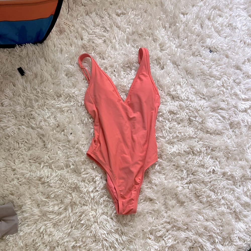 Cute Peach one- piece with an open back